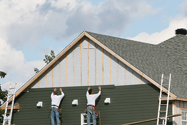 Professional Siding technician working in Philo, OH